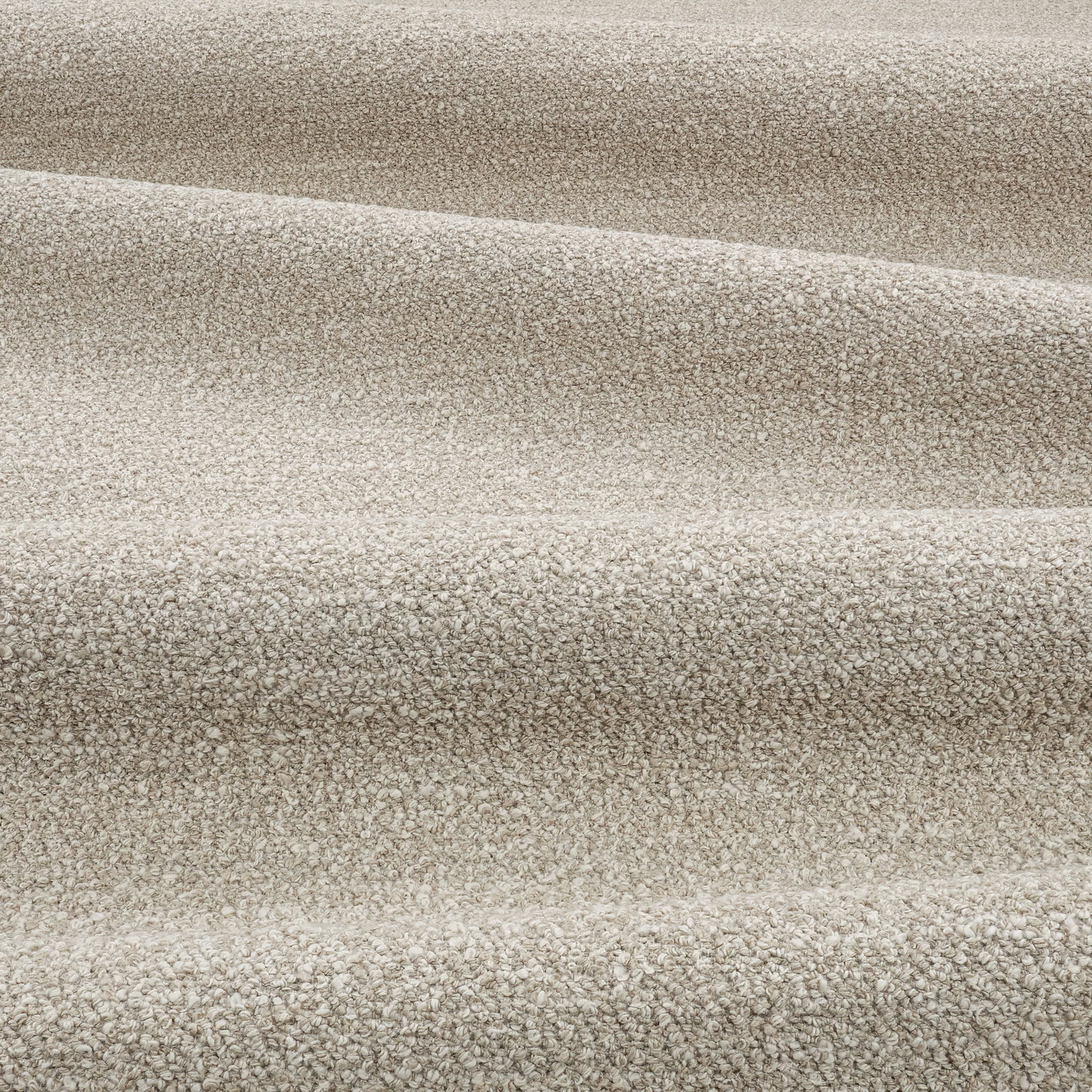 Warm sand beige nubby textile with subtle taupe flecks across folded swatch