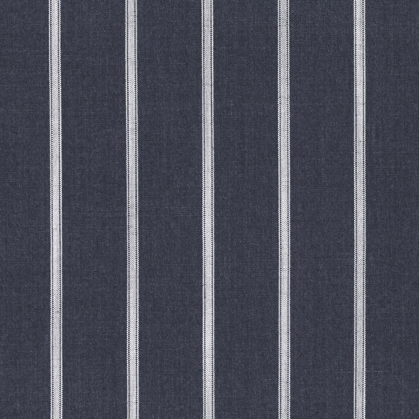 Close-up of deep indigo ticking fabric with narrow ivory vertical stripes and woven texture