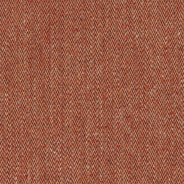 Close view of warm russet-red woven herringbone with fine cream-brown flecks