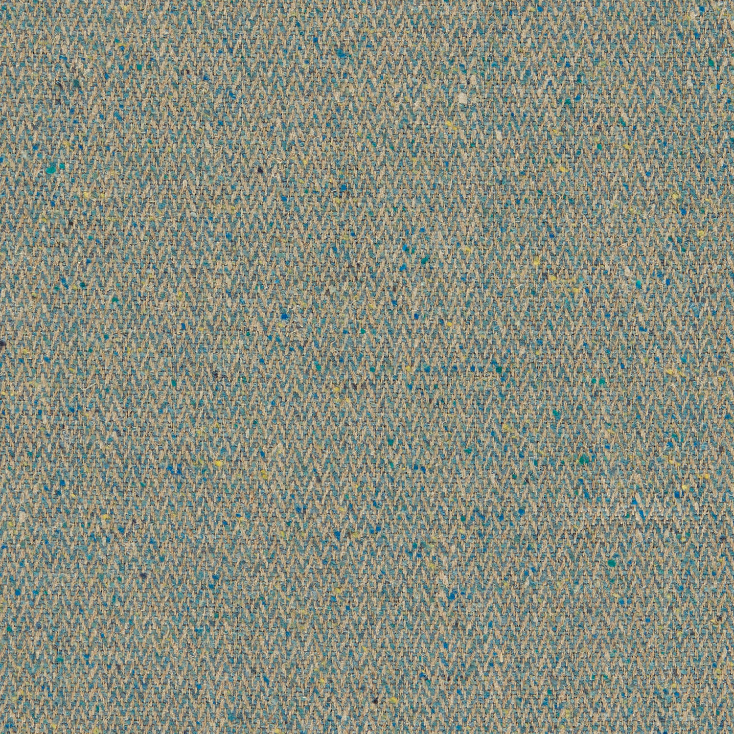Close-up of muted teal woven fabric with tiny aqua, beige and ochre chevrons