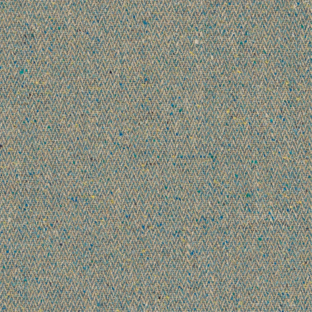 Close-up of muted teal woven fabric with tiny aqua, beige and ochre chevrons