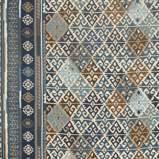 Indigo, aqua and cream geometric woven fabric with an ornamental vertical border