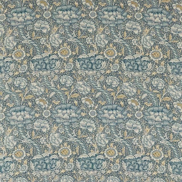 Muted blue and stone floral upholstery fabric with scrolling leaves and ochre flower centres