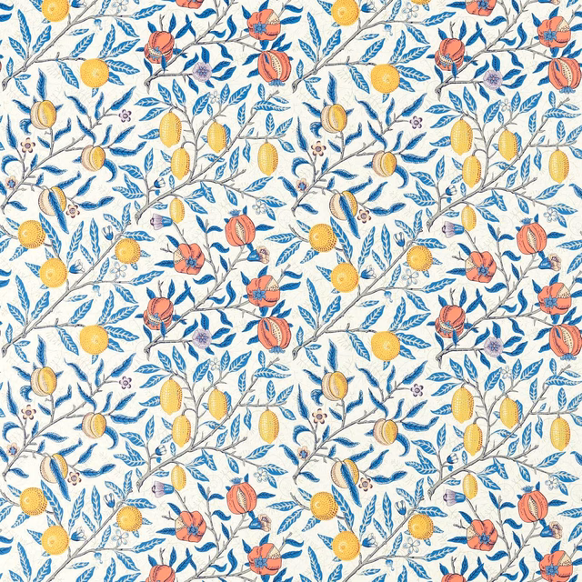 Cream fabric with blue leafy branches, yellow citrus and coral fruit motifs