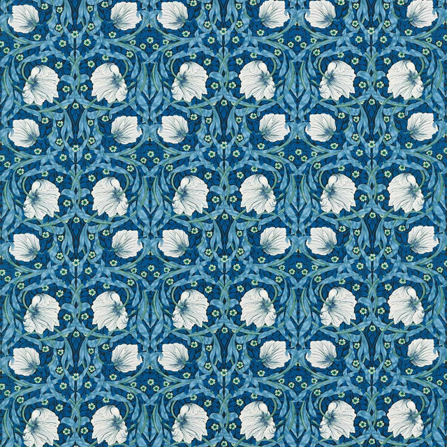 Midnight blue floral weave with opal flowers, leafy stems and tiny lime buds