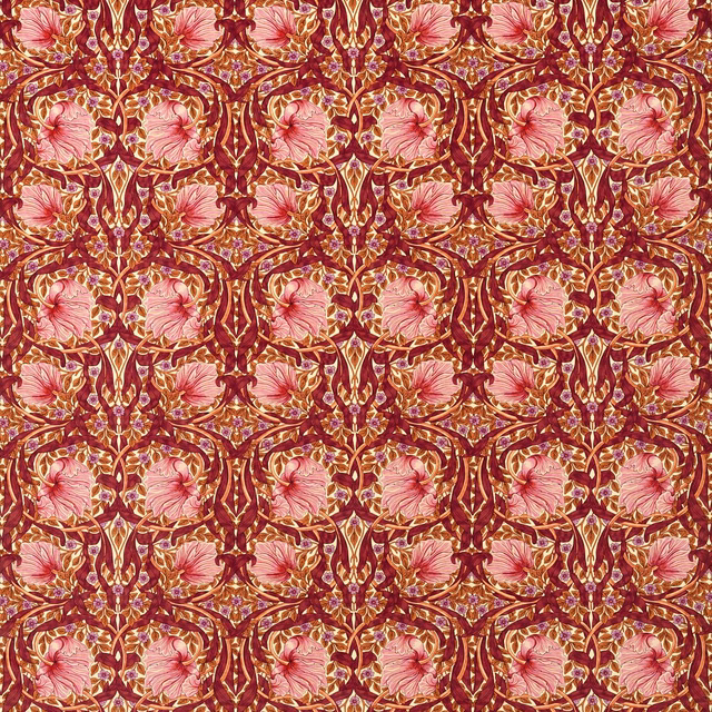 Burgundy velvet with pink flowers and ornate gold scrolling vine lattice