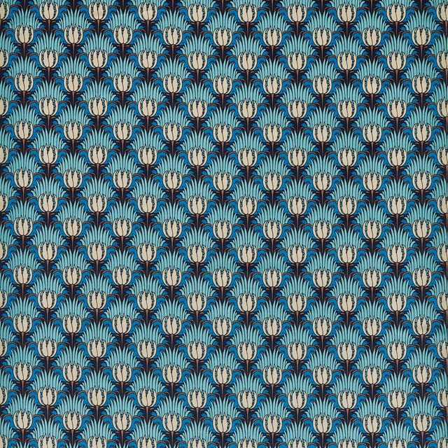 Sea-foam tulip motifs repeating across a deep teal velvet ground