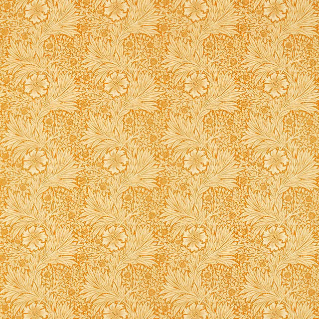 Warm marigold-orange botanical fans and flowers on a cream ground, close-up textile swatch