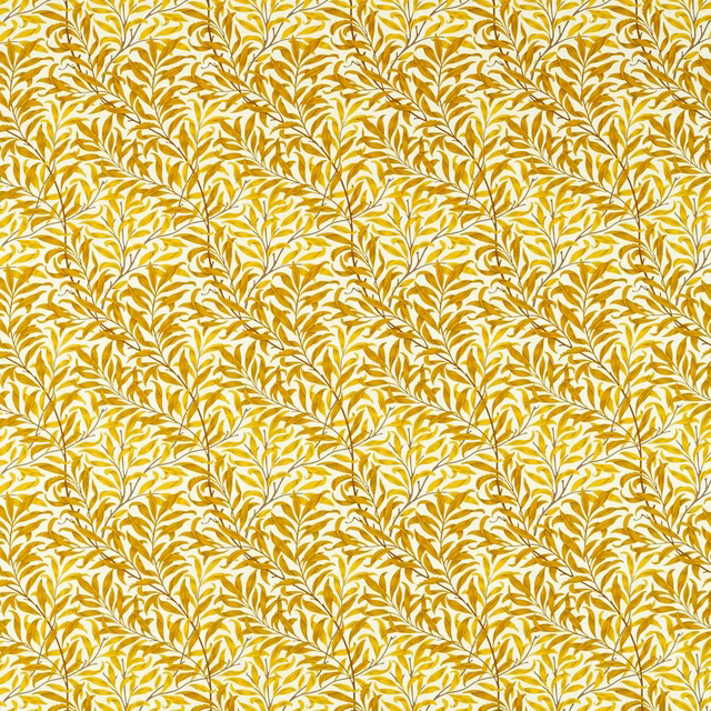 Dense mustard-yellow leafy boughs on a cream ground with a close botanical repeat