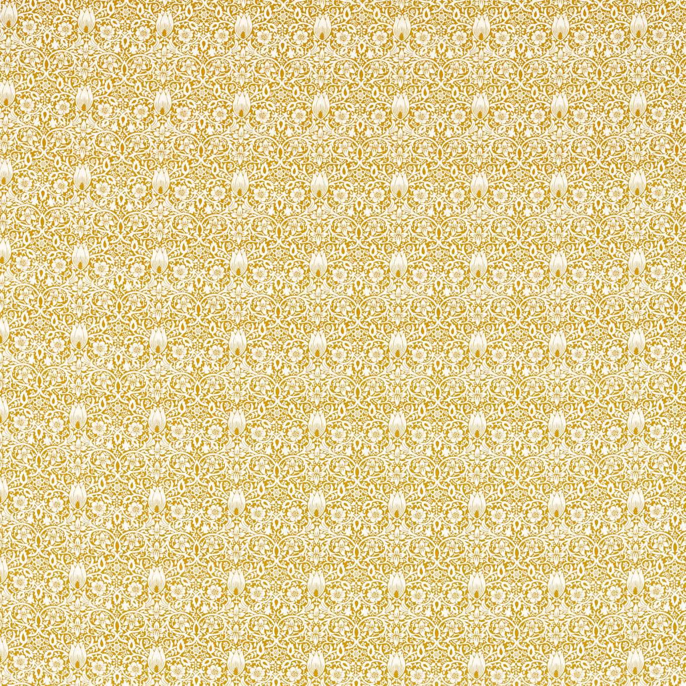 Sunflower-yellow fabric with dense cream scrolling florals and tiny repeating motifs