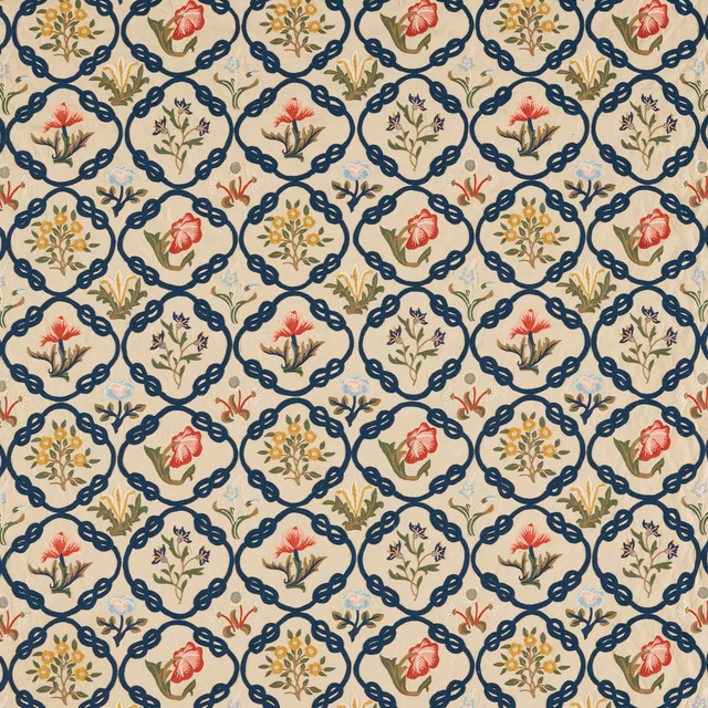 Cream fabric with indigo lattice cartouches, rose flowers and olive botanical sprigs