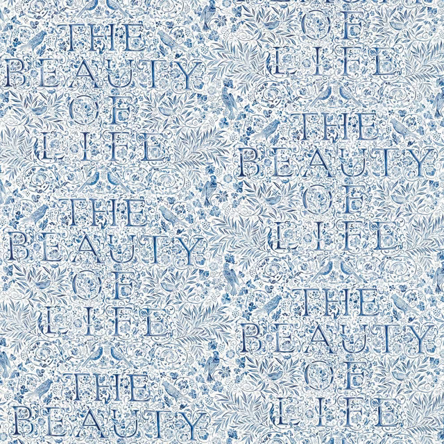 Pale indigo botanical textile with repeated serif words THE BEAUTY OF LIFE