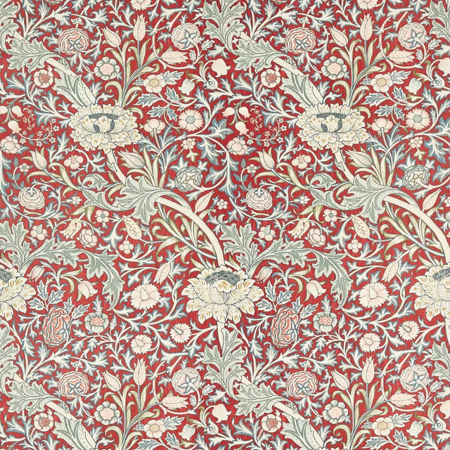 Madder red floral textile with pale blue foliage and cream blossoms