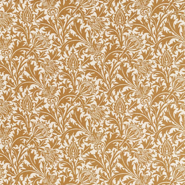 Ochre brown and cream woven botanical fabric with scrolling stems and paisley leaves
