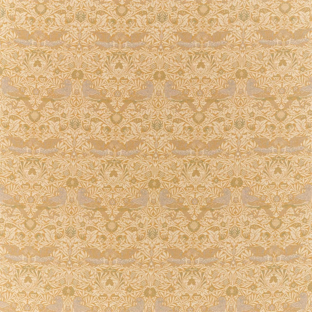 Warm ochre woven textile with pale botanical birds and repeating horizontal bands