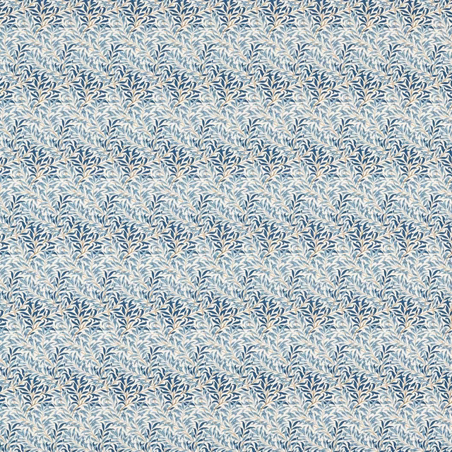 Pale woad-blue fabric with dense cream and blue leafy boughs in a small repeat