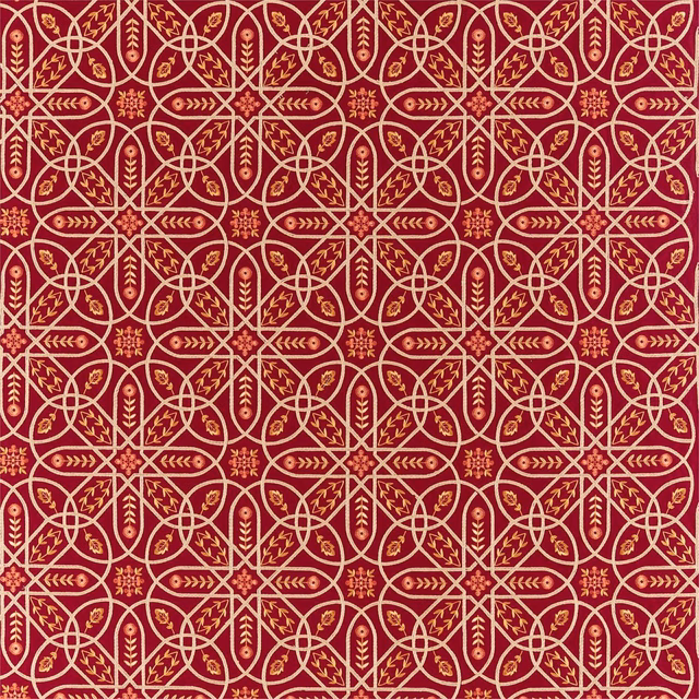 Wine-red embroidered textile with cream-gold interlocking leaves and geometric medallions