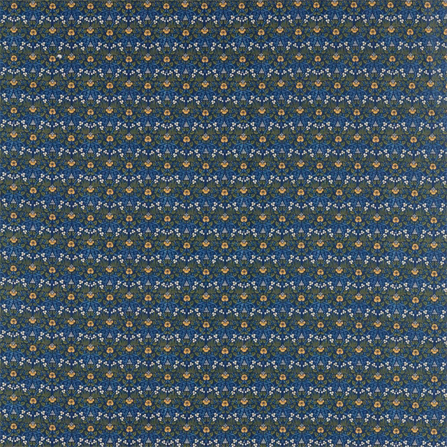 Dense indigo woven ground with tiny gold, ivory and blue floral motifs