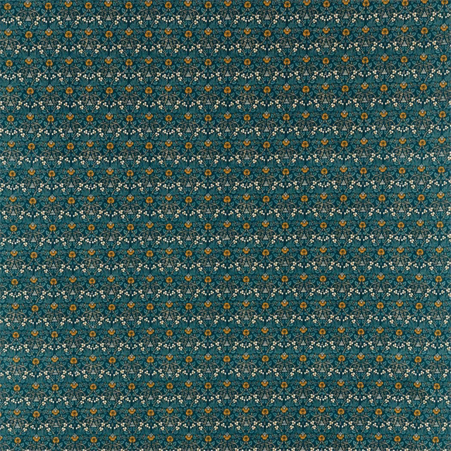 Deep teal woven fabric with tiny ochre botanical motifs and pale blue accents
