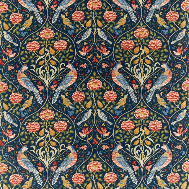 Deep indigo fabric with coral flowers, pale foliage and paired long-tailed birds