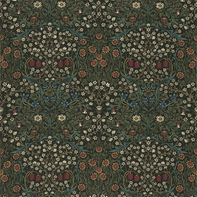 Dense botanical fabric in deep moss green with berry, cream and blue flowers