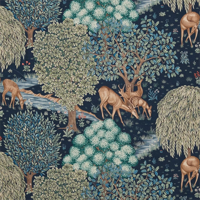 Deep navy woodland tapestry with blue-green trees, russet deer and pale blooms
