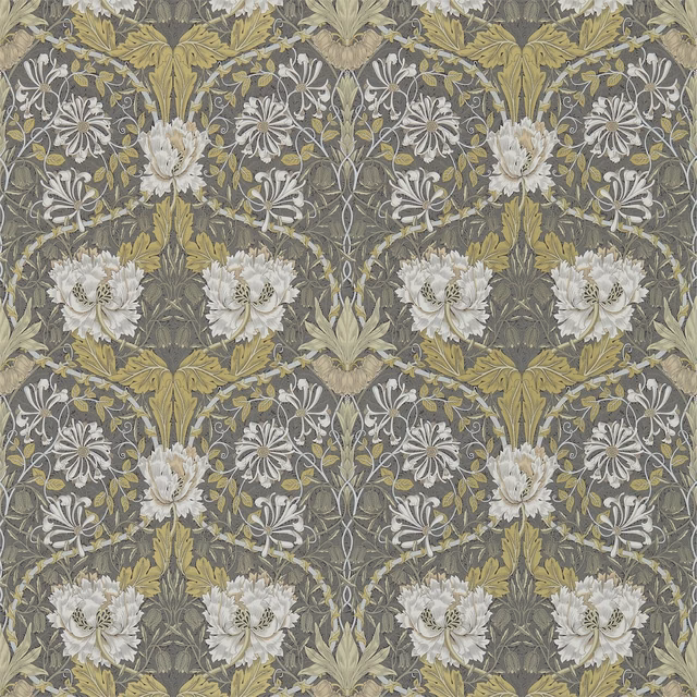 Charcoal wallpaper with pale flowers and muted gold olive foliage