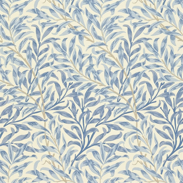 Muted blue willow branches on a softly textured cream wallpaper ground
