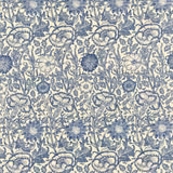 Vellum cream fabric with dense indigo flowers, leaves and curling stems