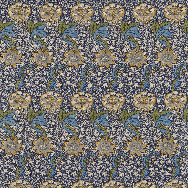 Indigo floral fabric with gold blooms, blue leaves and dense scrolling foliage