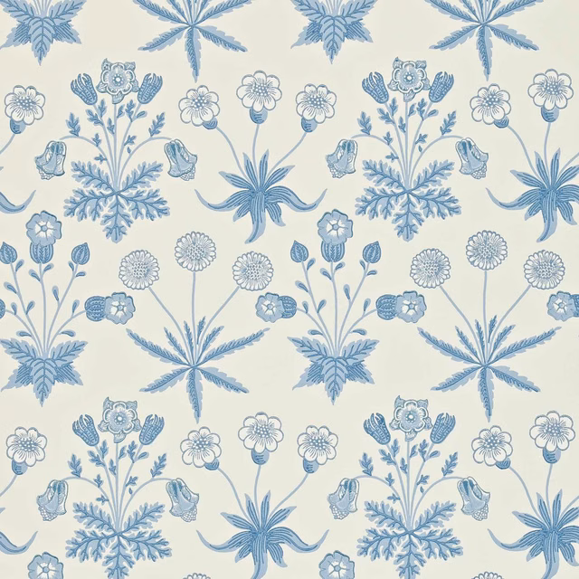 Ivory wallpaper with repeating pale blue flowers, leafy sprays and star-shaped botanical motifs