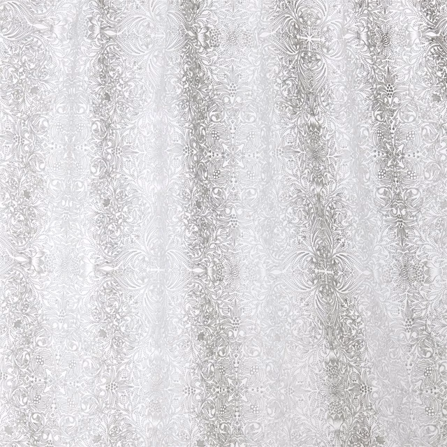 Pale dove-grey embroidered scrolls forming dense vertical bands on a white ground