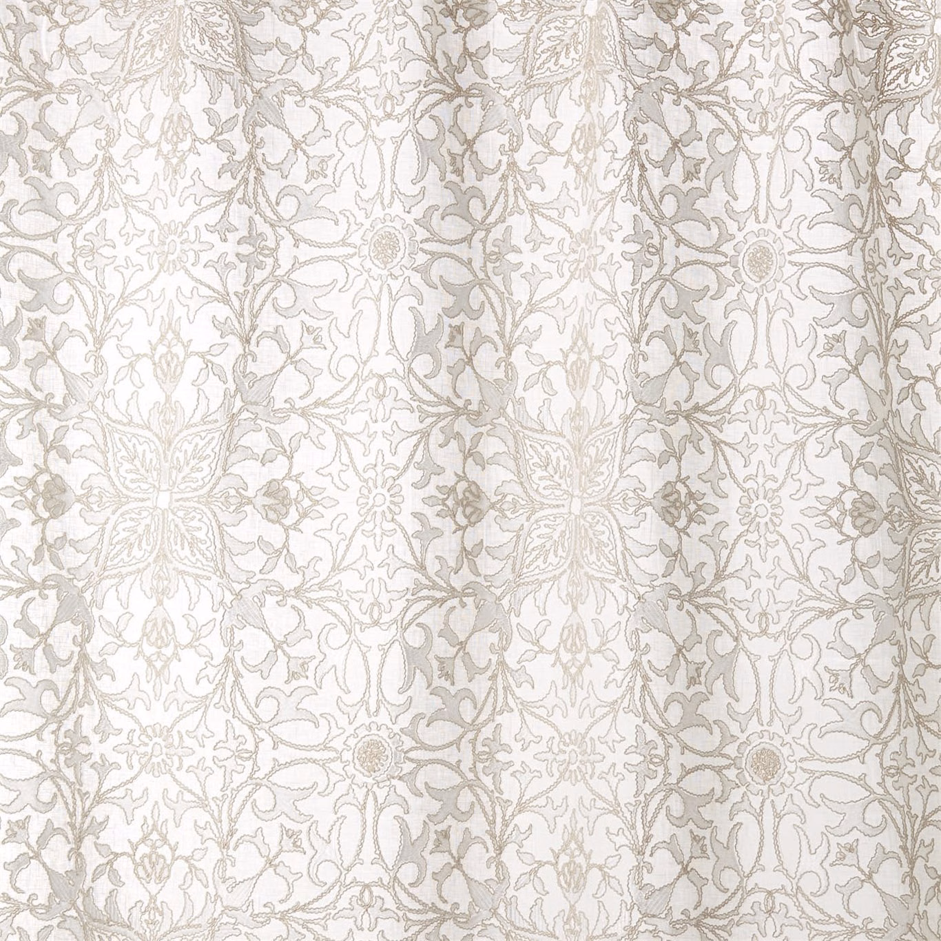 Paper white embroidered net with pale grey scrolling florals, leaves and rosettes