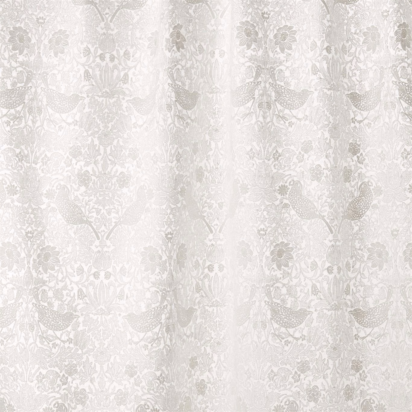 Paper-white fabric with dove-grey peacocks, flowers and scrolling botanical embroidery