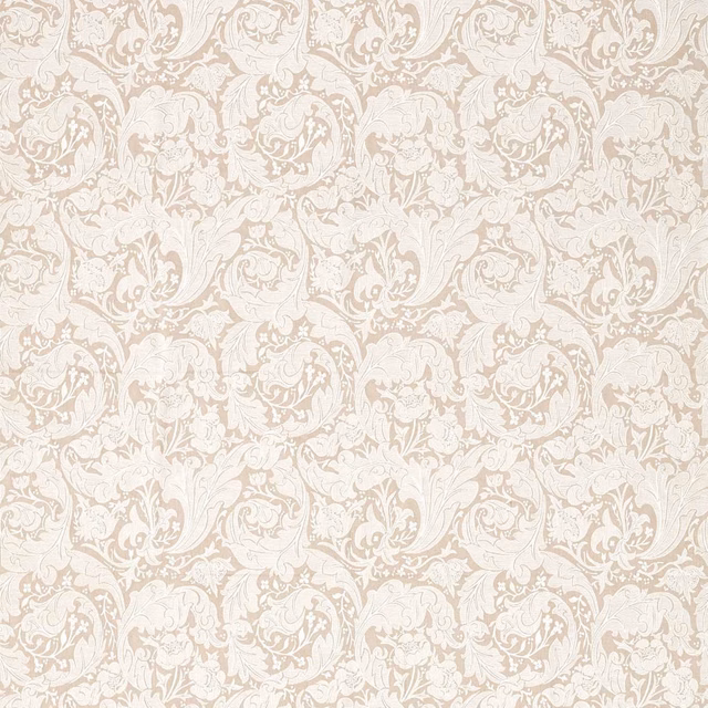 Pale flax fabric with ivory embroidered scrolling foliage and softly raised texture