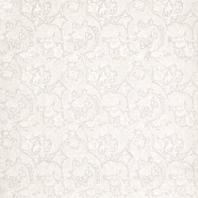 Pale grey-blue embroidered scrolling floral pattern with softly raised, chalky texture