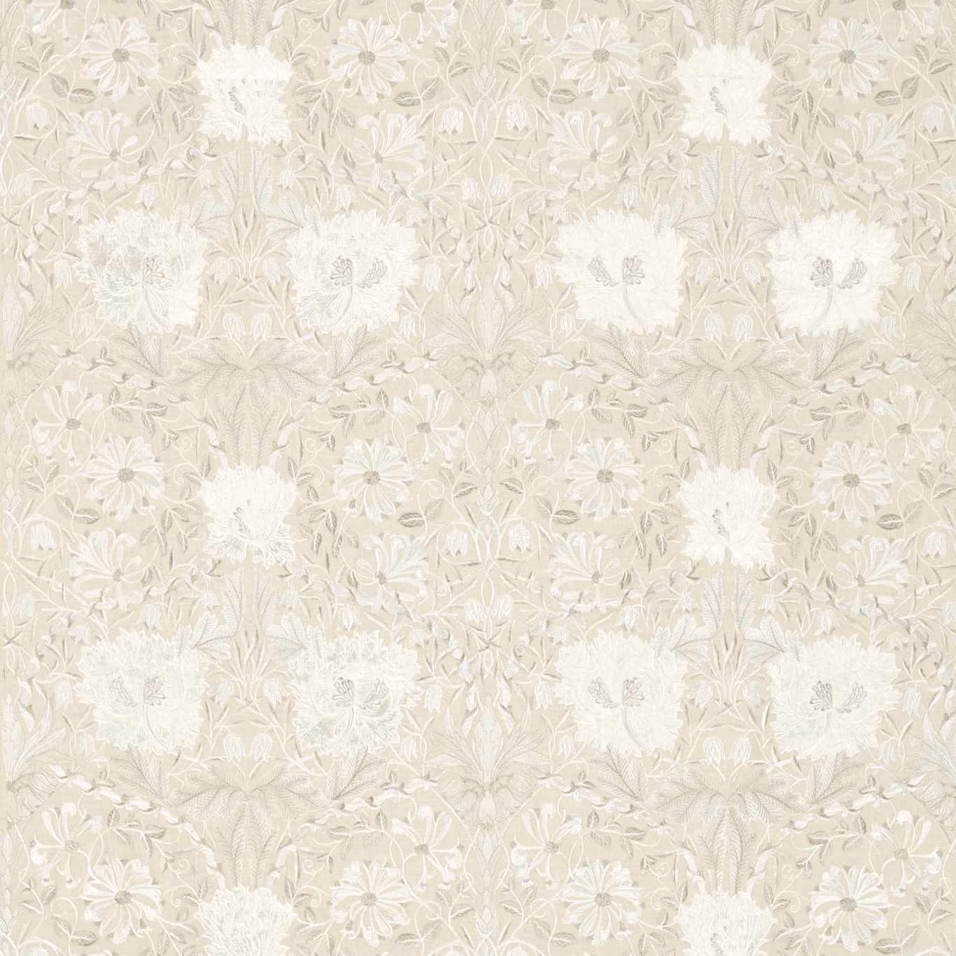 Warm ivory embroidered linen with chalk-white blooms and pale taupe trailing foliage