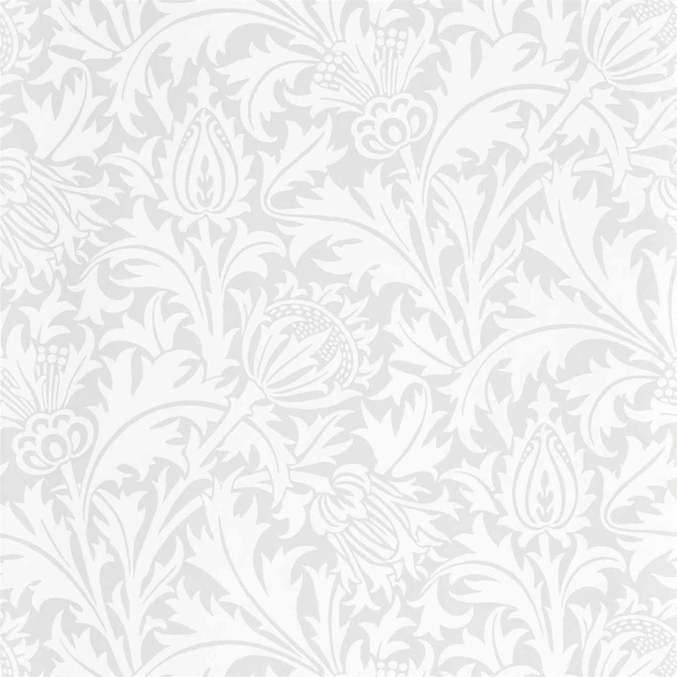 Pale grey-blue botanical wallpaper with white scrolling leaves and stylised flowers