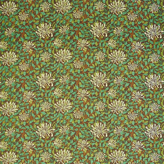 Teal botanical textile with cream flower sprays and olive-brown leafy detail