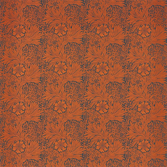 Burnt orange floral textile with navy outlines and repeating fan-like leaf motifs