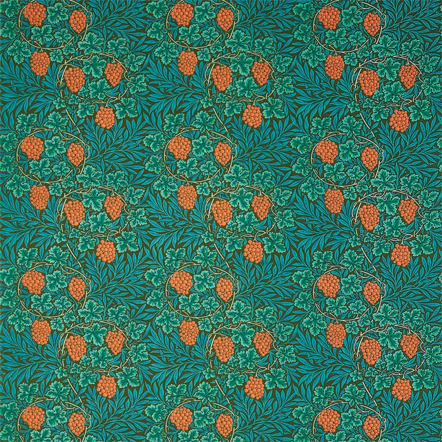 Dark olive-teal fabric with orange berries and curling leafy vine motifs