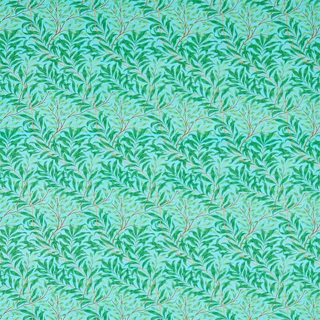 Sky turquoise fabric with dense green leafy boughs and fine branching stems