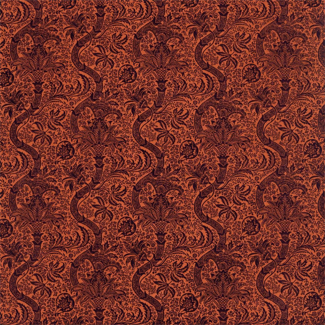Russet and mulberry velvet with dense scrolling floral motifs and tonal depth