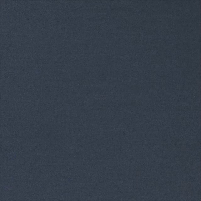 Close-up of deep ink-blue plain weave with subtle charcoal tonal texture