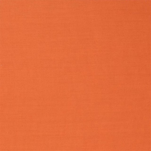 Close-up of warm paprika terracotta plain weave with subtle horizontal texture