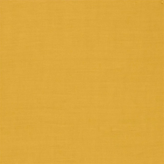 Close-up of saffron-gold plain weave showing fine horizontal and vertical texture