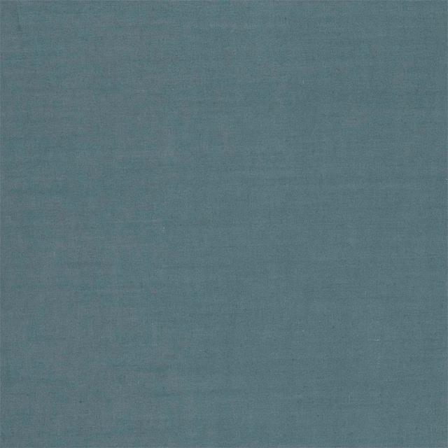 Close-up of muted blue-grey slate fabric with a subtle, even woven texture