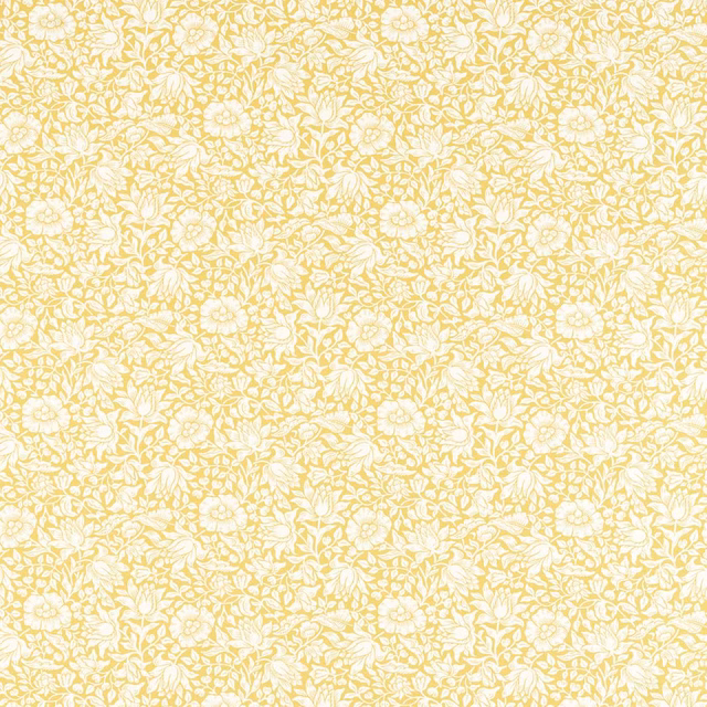 Pale butter-yellow floral sprigs and blossoms on a softly textured cream ground