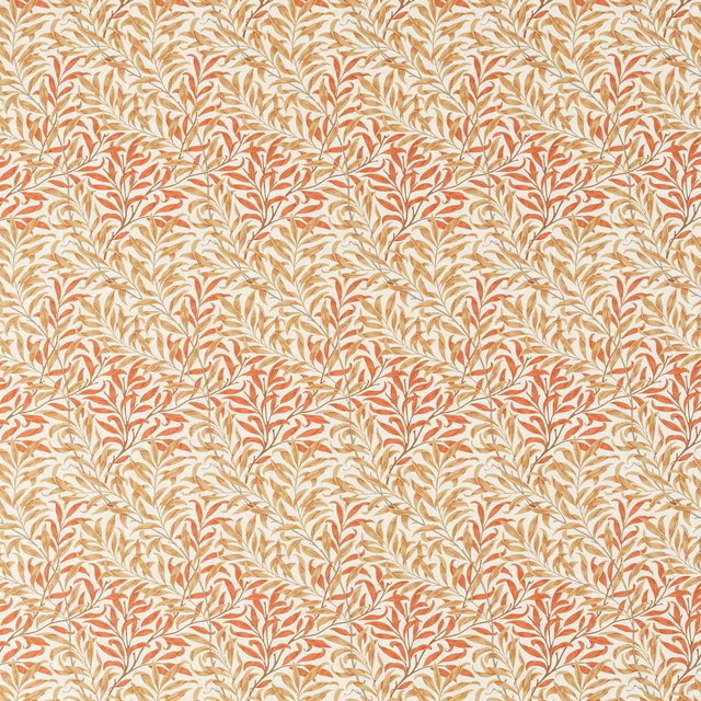 Cream fabric with dense russet and ochre leafy boughs in a fine all-over pattern