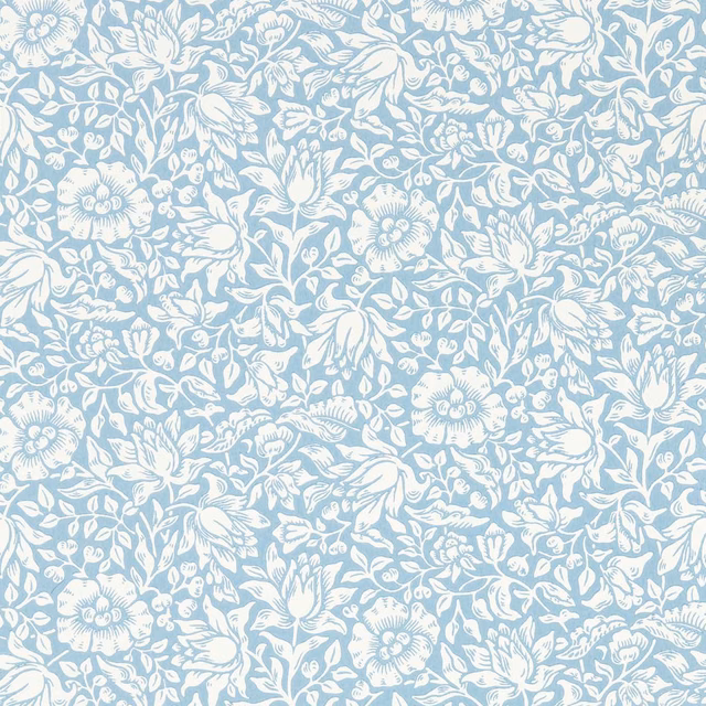 Soft powder-blue wallpaper with dense white flowers, leaves and curling botanical stems